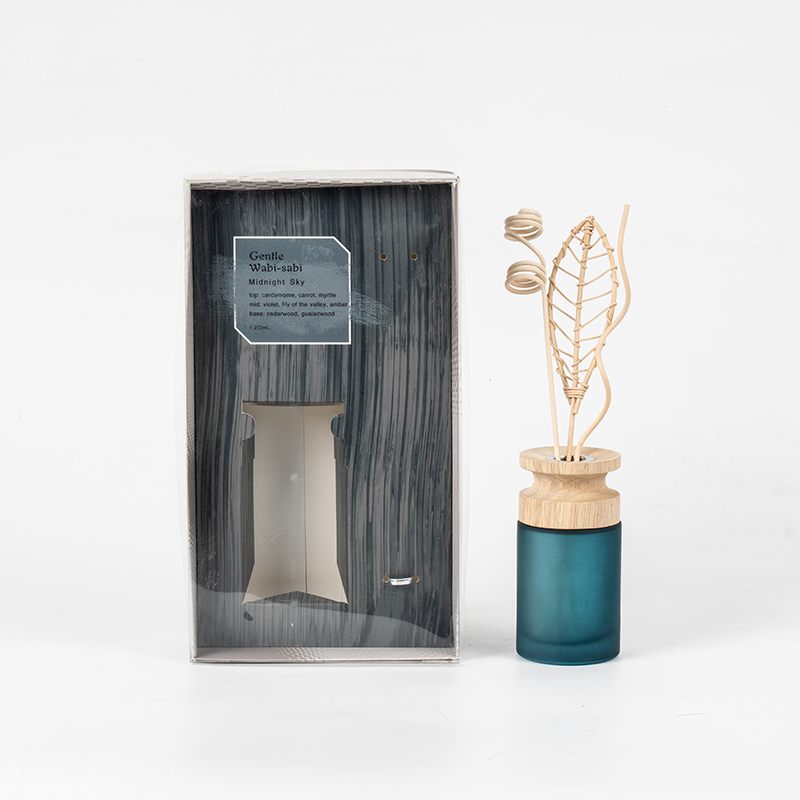 Difusor de palheta premium em frasco de vidro cilíndrico alto com difusor de aroma em bastão de madeira